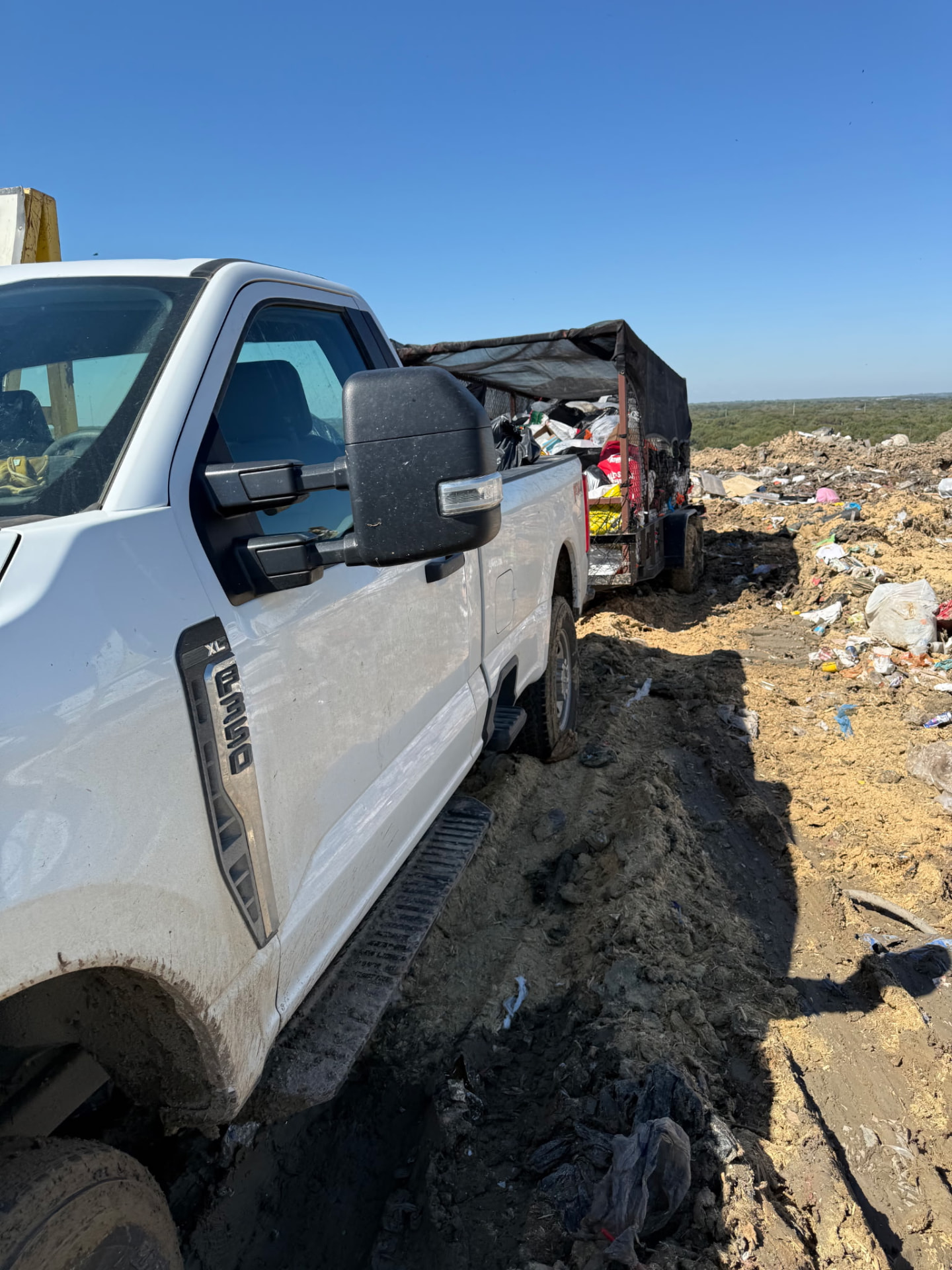 Atex Trash truck and trailer serving a North Texas route